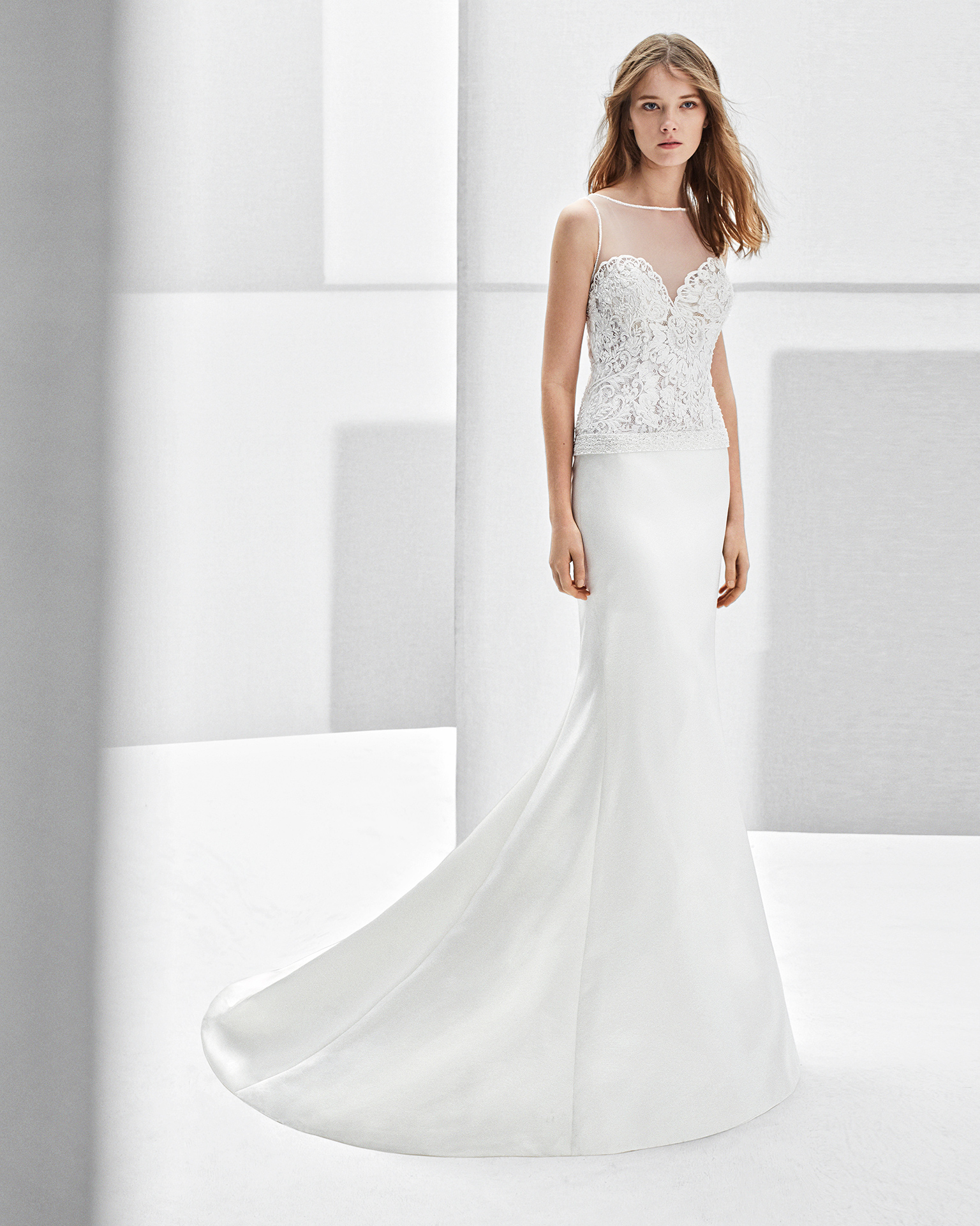 Classic-style duchess satin and lace wedding dress with sweetheart neckline, low back and beadwork detail, in ivory.