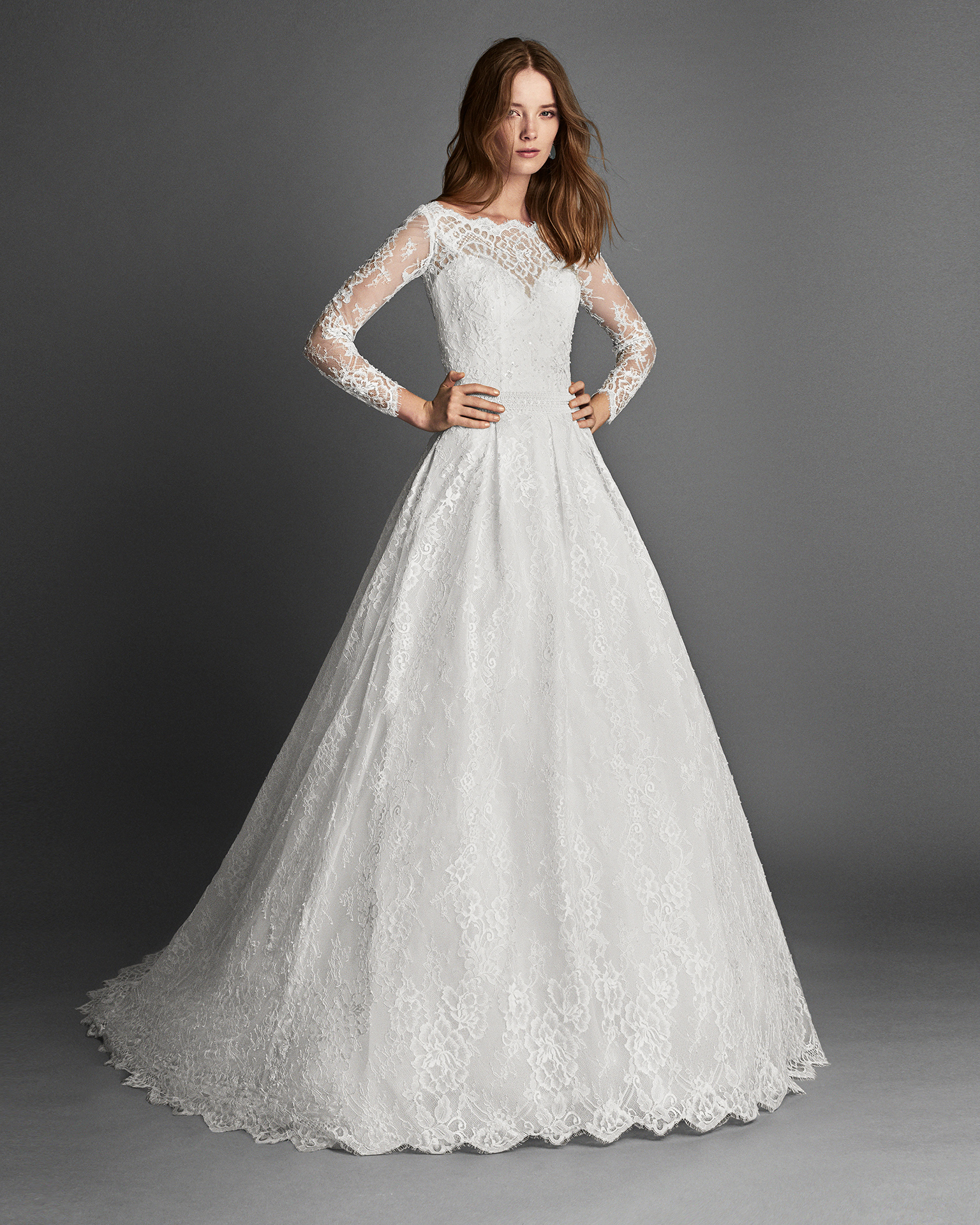Princess-style beaded lace wedding dress with long sleeves, in natural.